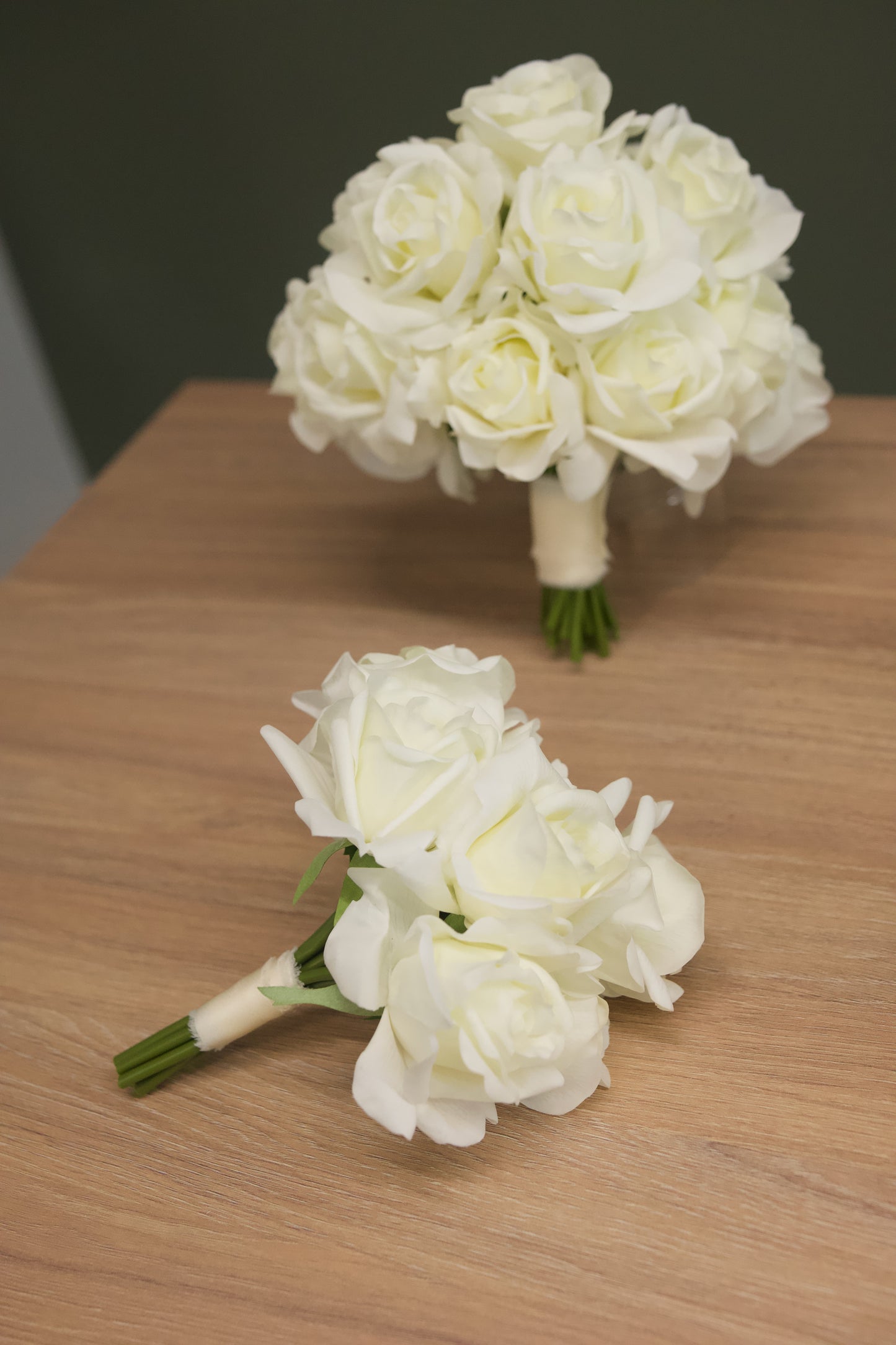 Bridal and bridesmaid bouquets made of white roses