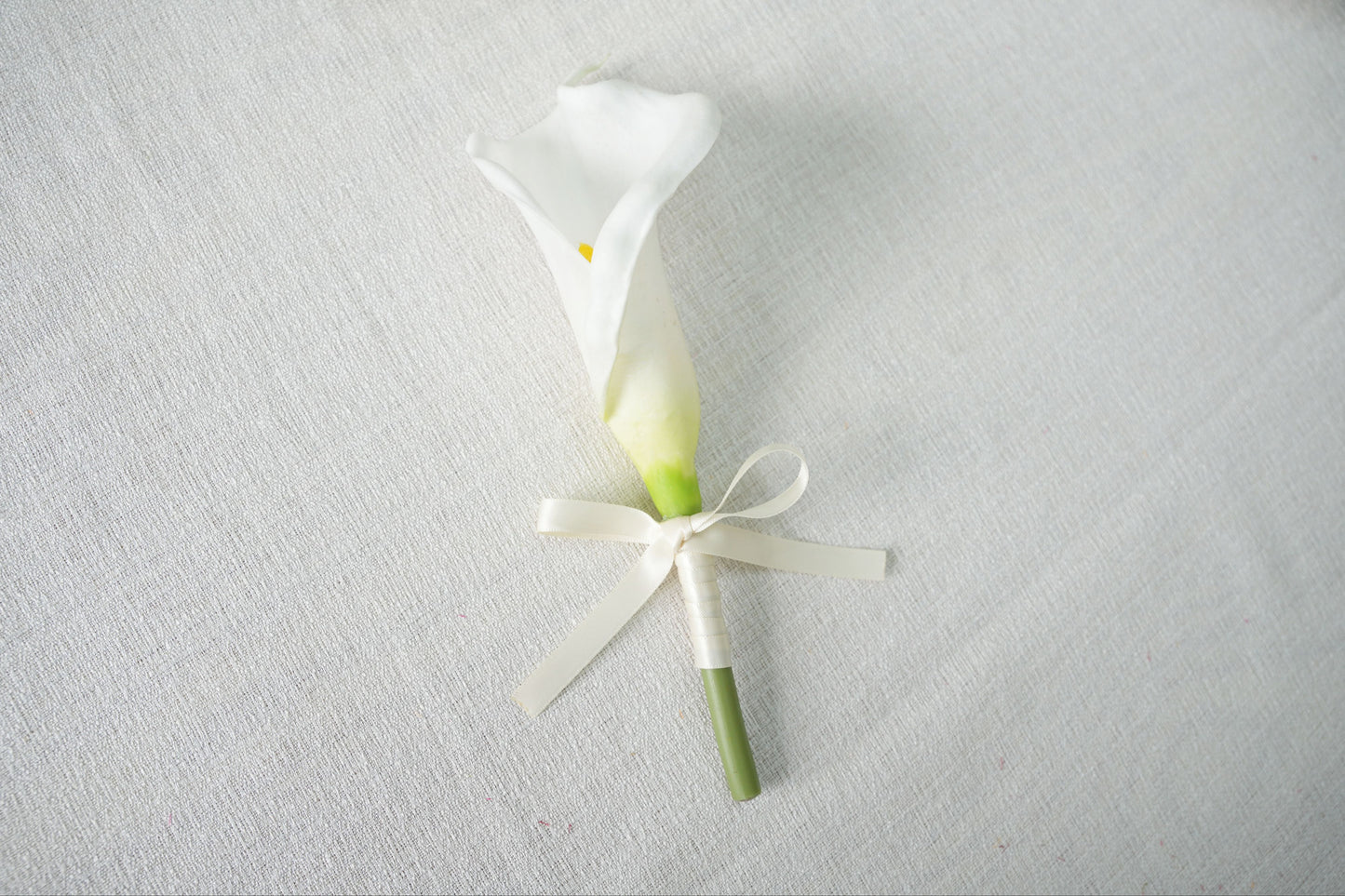 Sophisticated Elegance - Lily Buttonhole